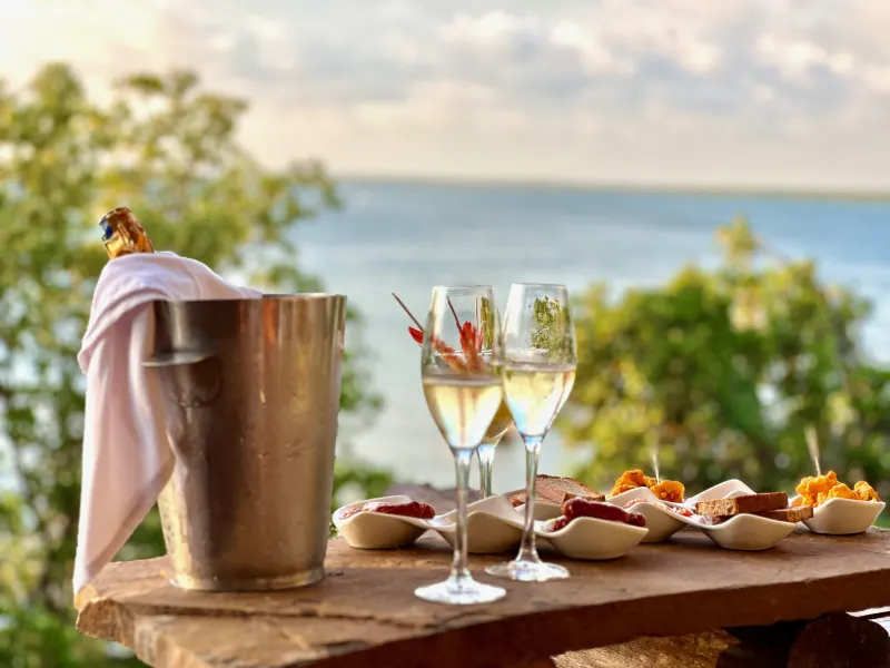 A sunset aperitif with champagne overlooking the ocean at The Rock & Sea