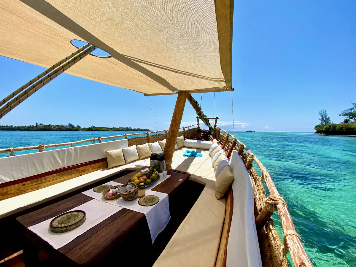 Looking out from the shaded deck of the dhow across the turquoise shallows of Mida Creek