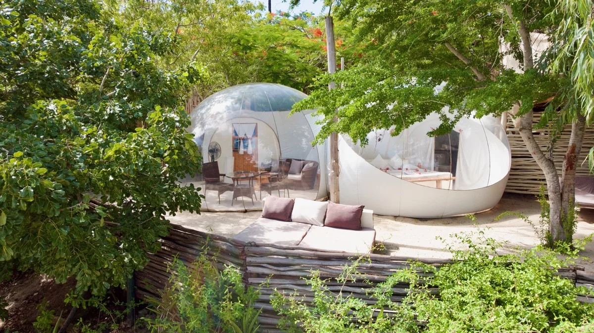 The bubble lodges and suites of The Rock & Sea above Mida Creek