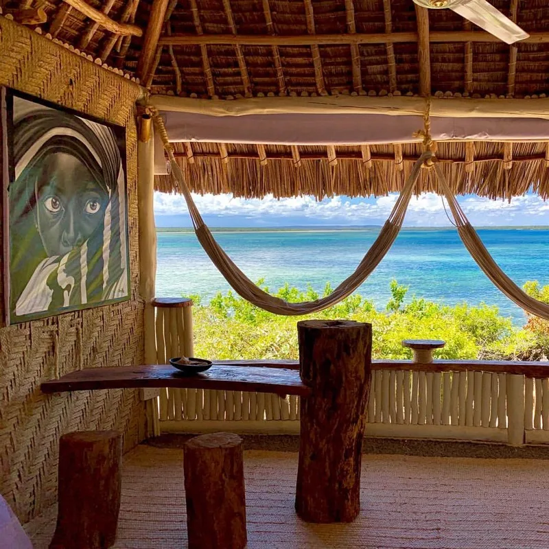 The Imperial Banda suite with its wide wooden terrace looking out over Mida Creek and the ocean